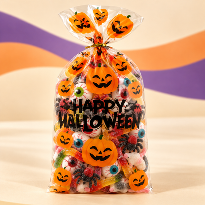 Halloween Limited Candy Community Mix: Halloween Beutel – 300 g auf cremefarbenem Hintergrund mit orange-violetten Wellen